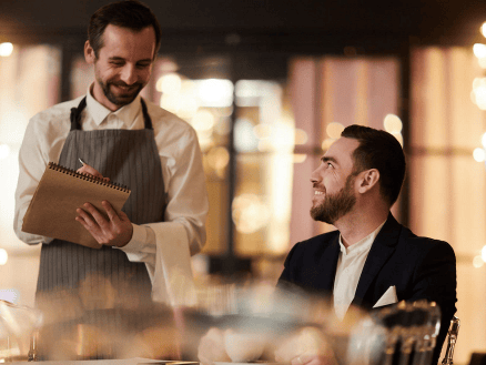 Welcoming Customers Taking Orders